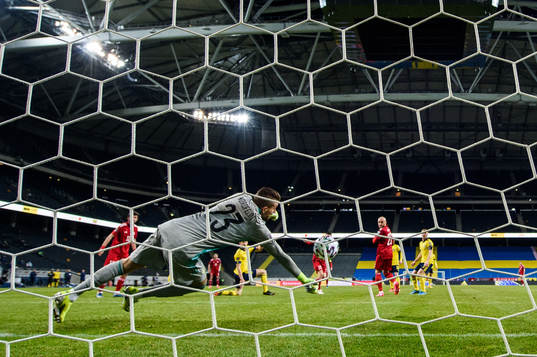 goalkeeper Kristoffer Nordfeldt of Sweden with a save