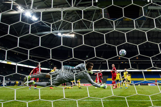goalkeeper Kristoffer Nordfeldt of Sweden with a save