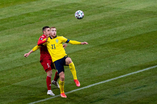 Guram Giorbelidze of Georgia and Dejan Kulusevski of Sweden