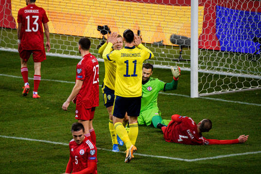 Viktor Claesson and Zlatan Ibrahimovic of Sweden celebrate