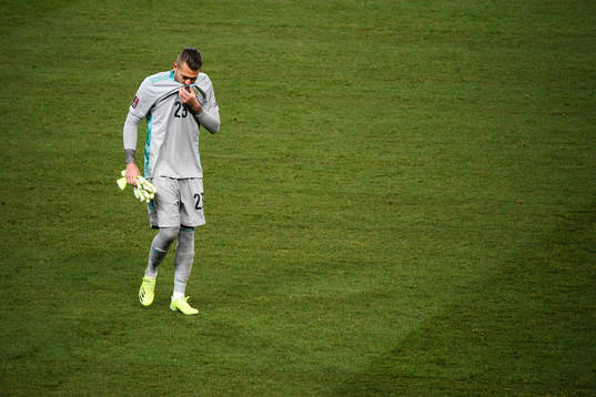 Goalkeeper Kristoffer Nordfeldt of Sweden looks dejected