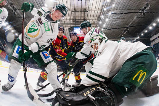 Färjestads Jacob Peterson, målvakt Arvid Holm och Jens