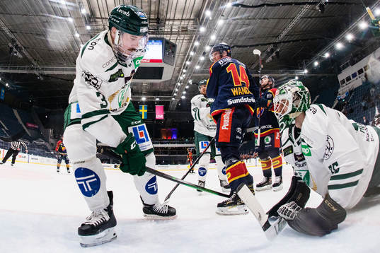 Färjestads Jens Westin och målvakt Arvid Holm