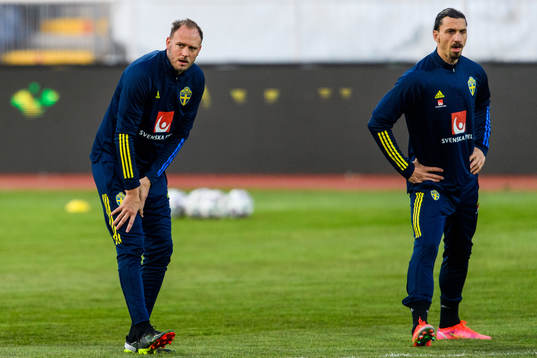 Anderas Granqvist and Zlatan Ibrahimovic of the Swedish