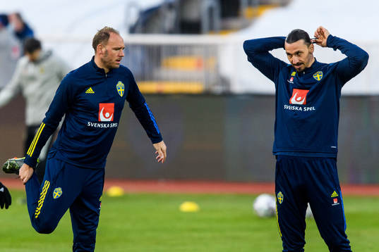 Anderas Granqvist and Zlatan Ibrahimovic of the Swedish