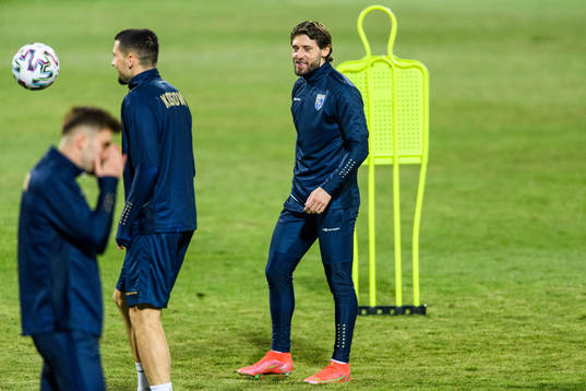 Arber Zeneli of the Kosovo national football team warm up