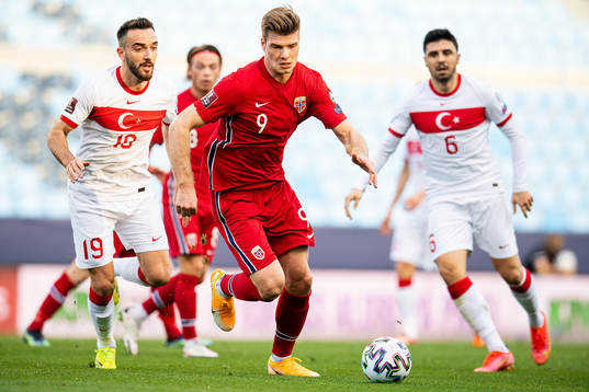 Kenan Karaman of Turkey and Alexander Sørloth of Norway