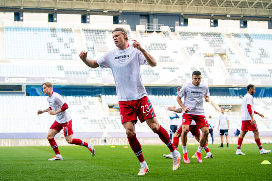 Erling Braut Haaland of Norway warms up wearing a t-shirt