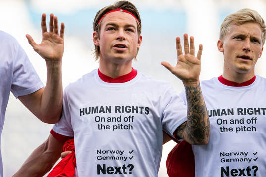 Patrick Berg and Birger Meling of Norway wearing a t-shirt