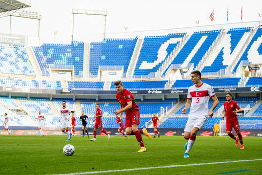 Alexander Sørloth of Norway and Mert Müldür of Turkey