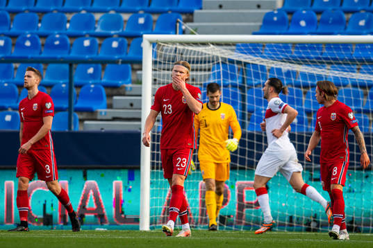 Kristoffer Ajer and Erling Braut Haaland look dejected