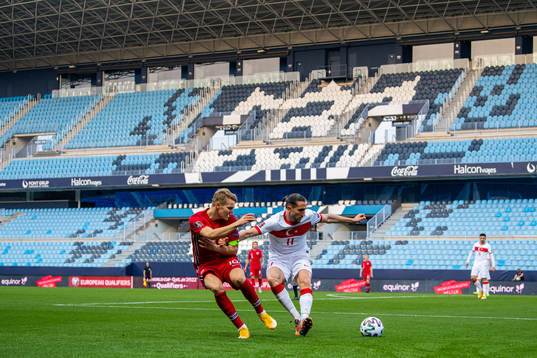 Martin Ødegaard of Norway and Yusuf Yazici of Turkey