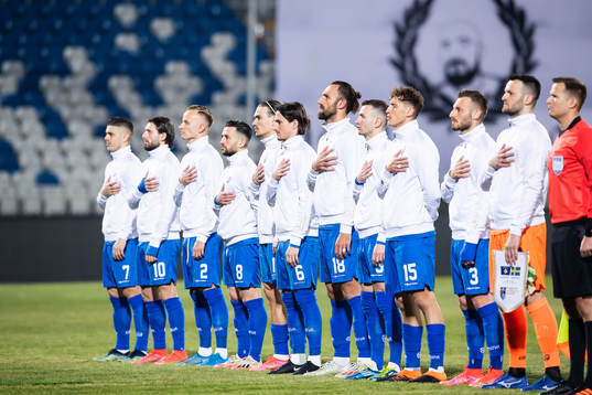 Players of Kosovo line up