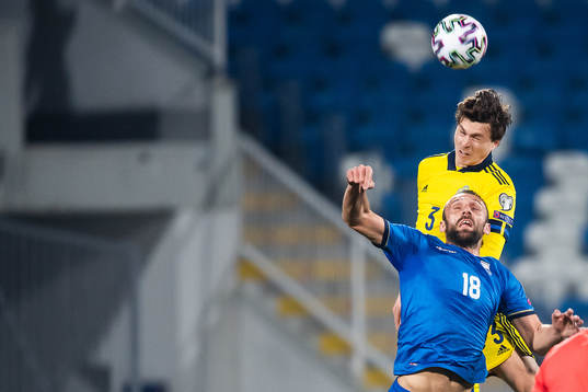 Victor Nilsson Lindelöf of Sweden and Vedat Muriqi of