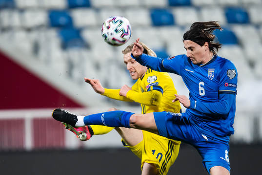 Hekuran Kryeziu of Kosovo and Emil Forsberg of Sweden
