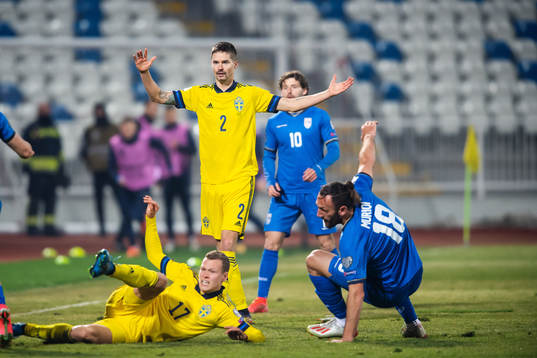 Mikael Lustig of Sweden reacts