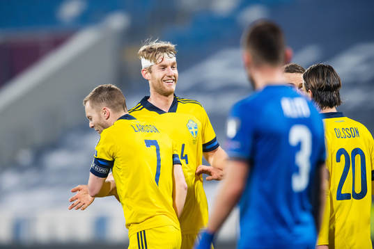 Sebastian Larsson and Filip Helander of Sweden celebrate