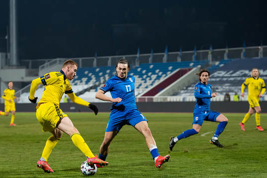 Dejan Kulusevski of Sweden and Benjamin Kololli of Kosovo