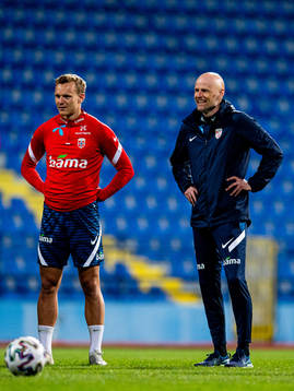 Marius Lode and Ståle Solbakken, head coach of the
