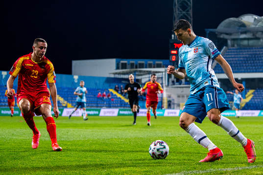 Adam Marusic of Montenegro and Mohamed Elyounoussi of Norway