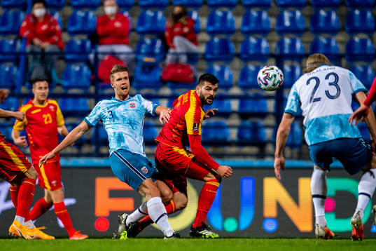 Kristoffer Ajer of Norway and Igor Vujacic of Montenegro