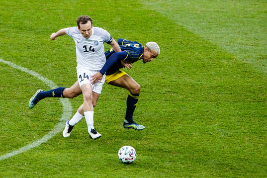 Konstantin Vassiljev of Estonia and Robin Quaison of Sweden