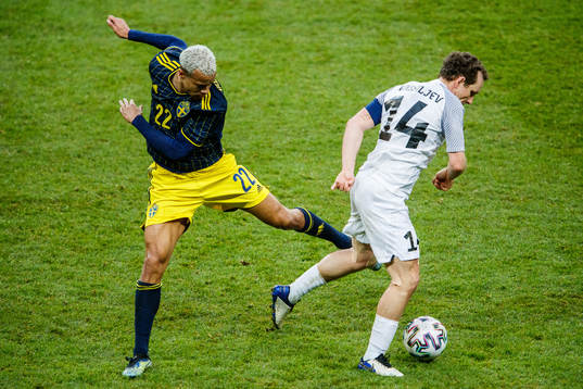 Robin Quaison of Sweden and Konstantin Vassiljev of Estonia