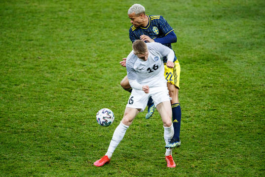Henrik Pürg of Estonia and Robin Quaison of Sweden