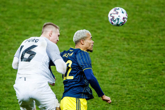 Henrik Pürg of Estonia and Robin Quaison of Sweden