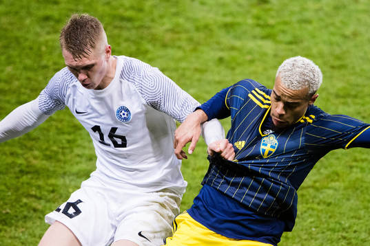 Henrik Pürg of Estonia and Robin Quaison of Sweden