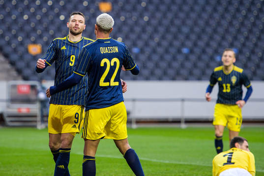 Marcus Berg and Robin Quaison of Sweden celebrate