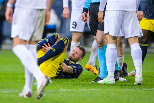 Marcus Berg of Sweden is in pain
