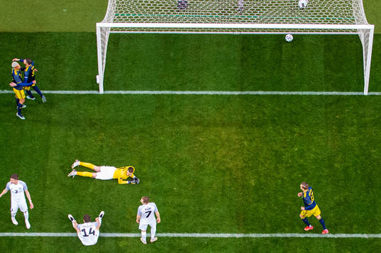 Robin Quaison celebrates with Marcus Berg of Sweden who