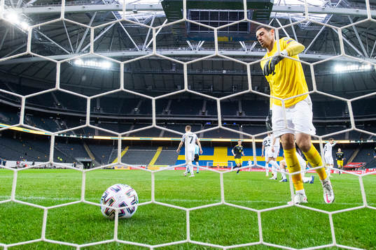 Goalkeeper Matvei Igonen of Estonia looks dejected