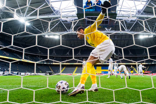 Goalkeeper Matvei Igonen of Estonia looks dejected