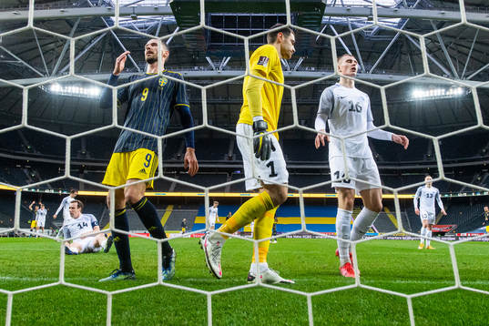 Marcus Berg of Sweden looks dejected next to goalkeeper