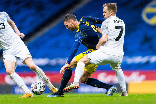 Marcus Berg of Sweden and Sander Puri of Estonia