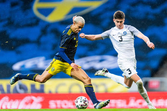 Robin Quaison of Sweden and Maksim Paskotsi of Estonia
