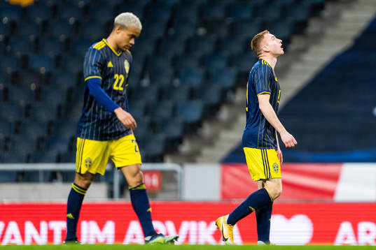 Robin Quaison and Dejan Kulusevski of Sweden look dejected