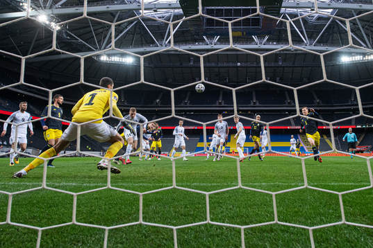 Marcus Berg, Carl Starfelt and Joakim Nilsson of Sweden in