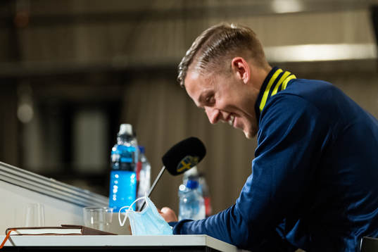 A face mask in front of Jesper Karlsson of Sweden