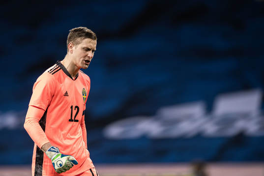 Goalkeeper Karl-Johan Johnsson of Sweden celebrate