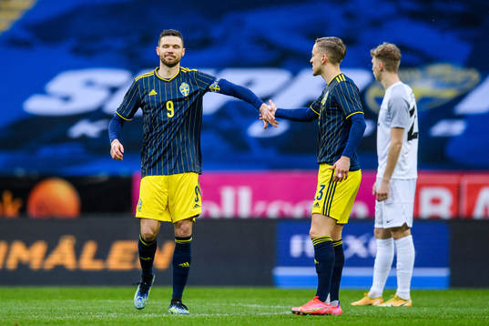 Marcus Berg and Jesper Karlsson of Sweden celebrate