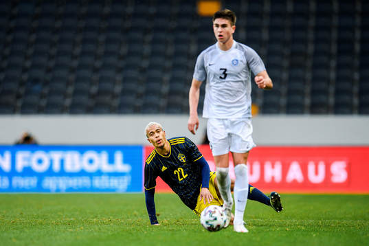Robin Quaison of Sweden and Maksim Paskotsi of Estonia