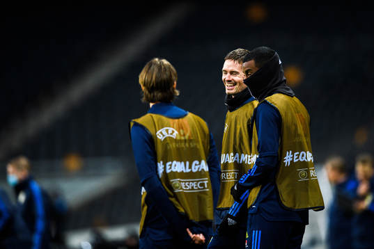 Mikael Lustig and Alexander Isak of Sweden