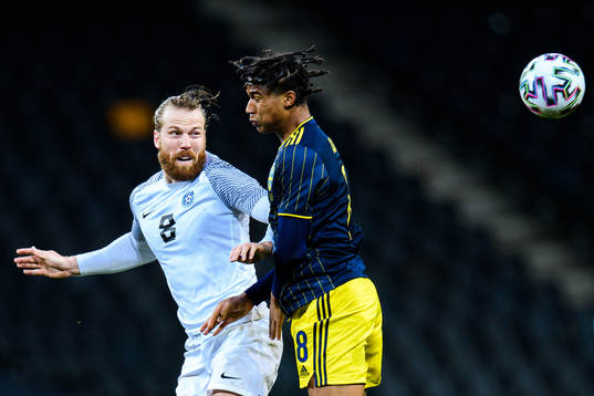 Henri Anier of Estonia and Jens-Lys Cajuste of Sweden