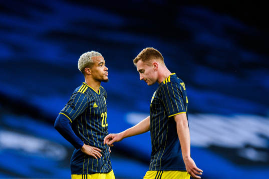 Robin Quaison and Dejan Kulusevski of Sweden look dejected