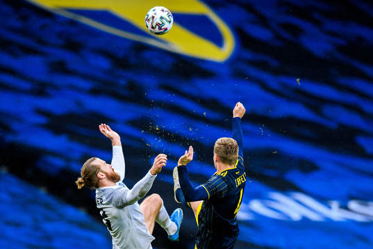 Henri Anier of Estonia and Carl Starfelt  of Sweden