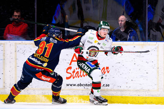 Djurgårdens Dick Axelsson och Frölundas Jesper Sellgren