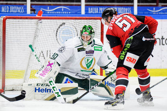 Färjestads målvakt Henrik Haukeland och Malmö Redhawks